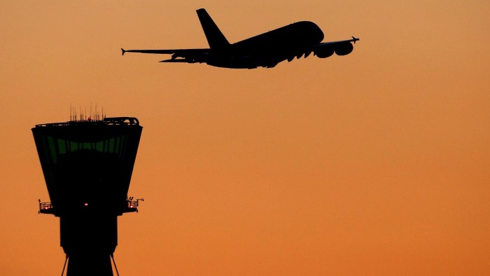 File photo dated 19/01/16 of a plane taking off past an air traffic control tower. An air disaster could be caused by low levels of English language ability among some pilots and air traffic controllers, a report has warned.