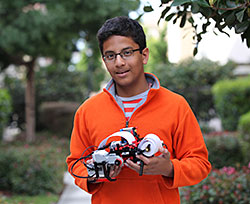Shubham Banerjee, aged 13, with his Lego-kit Braille printer
