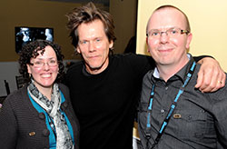 Needham with his wife Karen and actor Kevin Bacon at the Sundance Film Festival, 2009