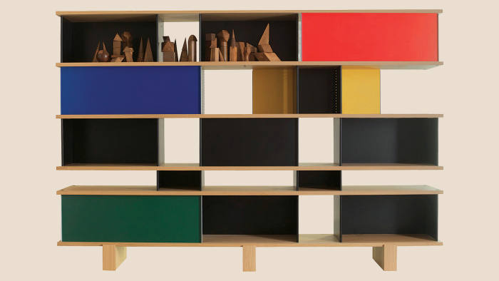 The Nuage bookcase with multicolored sliding doors and shelves