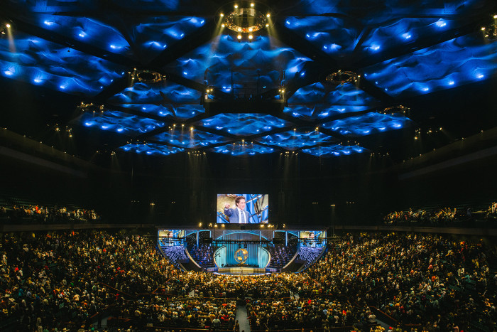 A Joel Osteen service at Lakewood Church in Houston, Texas, last month: 'Had he chosen the life of a preacher, Trump would surely have designed his church like Lakewood — with its curved stage, glitzy video screens and rotating golden globe'