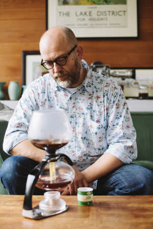 A photo of Tim Hayward using an espresso machine