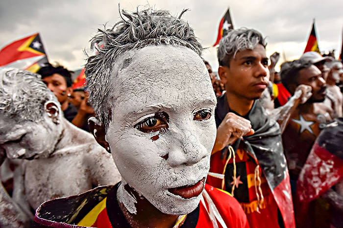 Fretilin party supporters participate in an election campaign rally in Dili, East Timor on July 19, 2017. East Timor's parliamentary election will take place on July 22. / AFP PHOTO / VALENTINO DARIEL SOUSAVALENTINO DARIEL SOUSA/AFP/Getty Images
