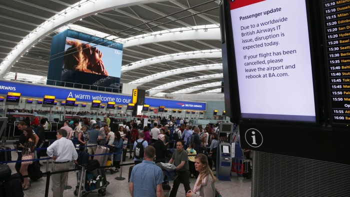 A displays warms passengers to &quot;Expect Disruption&quot; inside Terminal 5 of London's Heathrow Airport on May 29, 2017. Passengers faced a third day of disruption at Heathrow Monday as British Airways cancelled short-haul flights after a global computer crash that unions blamed on the outsourcing of IT services to India. The embattled airline said it was cancelling 13 short-haul flights from Heathrow Airport, Europe's busiest, but was aiming to operate a full long-haul schedule from the hub and was operating a full service from Gatwick Airport. / AFP PHOTO / Daniel LEAL-OLIVAS (Photo credit should read DANIEL LEAL-OLIVAS/AFP/Getty Images)