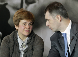 Russian billionaire and presidential candidate Prokhorov attends a news conference in Moscow...Russian billionaire and presidential candidate Mikhail Prokhorov (R) talks to his sister Irina Prokhorova during a news conference in Moscow February 28, 2012. Russians will go to the polls for their presidential election on March 4. REUTERS/Anton Golubev (RUSSIA - Tags: POLITICS ELECTIONS) - RTR2YKCX