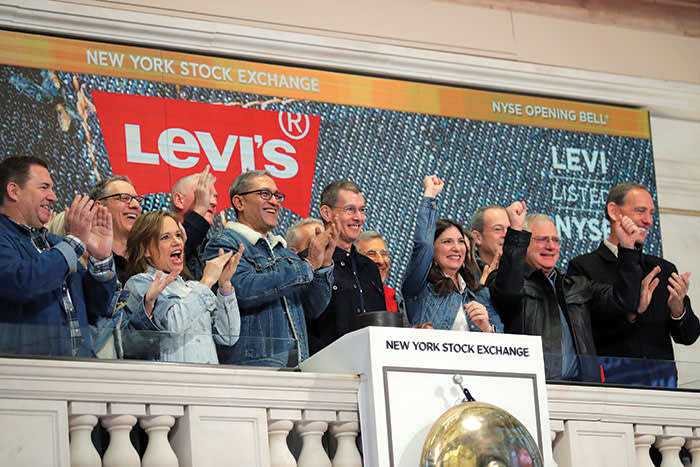 Chip Bergh, centre in black, rings the opening bell at Levi Strauss’s IPO in March last year