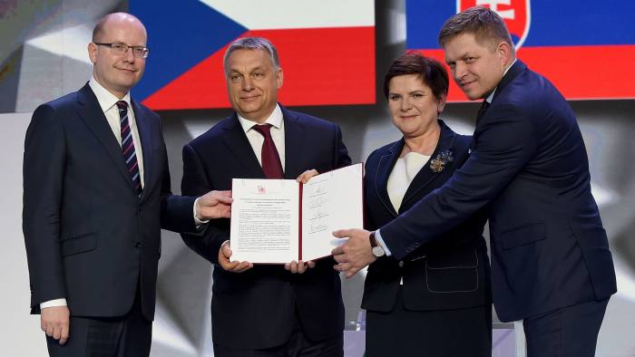 Czech Republic's Prime Minister Bohuslav Sobotka, Hungary' Prime Minister Viktor Orban, Poland's Prime Minister Beata Szydlo and Slovakia's Prime Minister Robert Fico show signed Warsaw's declaration