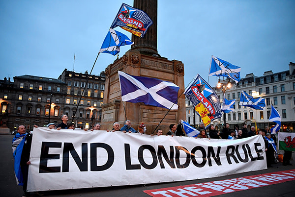 GLASGOW, SCOTLAND - MARCH 13: Independence supporters gather in George Square following today's announcement March 13, 2017 in Glasgow, Scotland. Scotland's First Minister Nicola Sturgeon has confirmed she will ask for permission to hold a second Scottish independence referendum. (Photo by Jeff J Mitchell/Getty Images) ***BESTPIX***