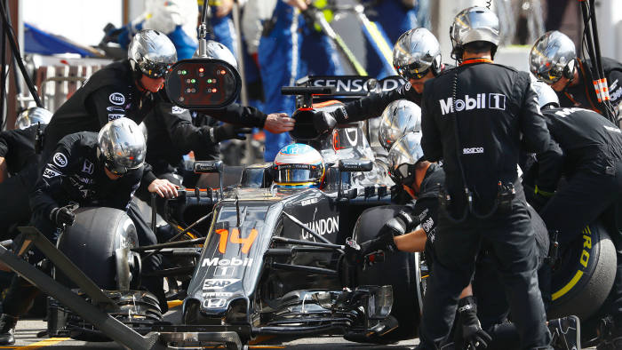 Fernando Alonso makes a pit stop.