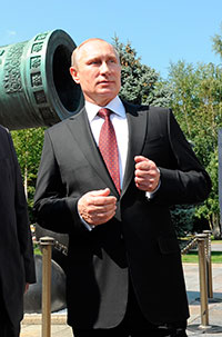Vladimir Putin with the Tsar Cannon in the grounds of the Kremlin