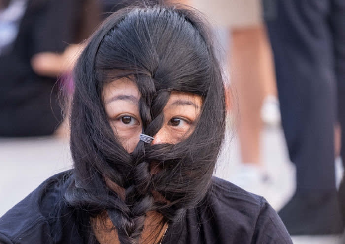 Hair is used to circumvent the ban on masks