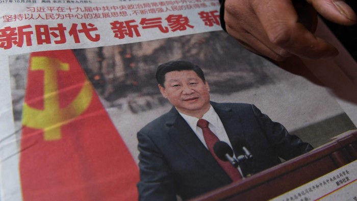 Newspapers featuring China's President are pictured at a news stand in Beijing on October 26, 2017,  day after he introduced China's new Politburo Standing Committee, the nation's top decision making body. 
Mao Zedong and Deng Xiaoping joined the pantheon of China's Communist immortals on the strength of their contributions to the nation. Xi Jinping is getting in on what political watchers say amounts to an &quot;IOU&quot;. The Communist Party this week amended its constitution to canonise President Xi's political &quot;thought&quot;, the highest honour a Chinese leader can achieve and somewhat akin to retroactively carving his name in granite as a founding father. / AFP PHOTO / GREG BAKERGREG BAKER/AFP/Getty Images