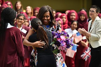 Students of Mulberry School in Tower Hamlets, London, welcome Michelle Obama this June