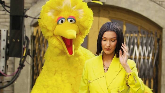 Bella Hadid in Dior paired with Sesame Street’s Big Bird