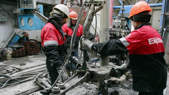 Workers seen at the Lukoil drilling rig in Druzhnoye, East Siberia, Friday, April 21, 2006. Photographer: Dmitry Beliakov/Bloomberg News.