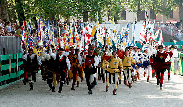 Standard bearers dressed in traditional costumes