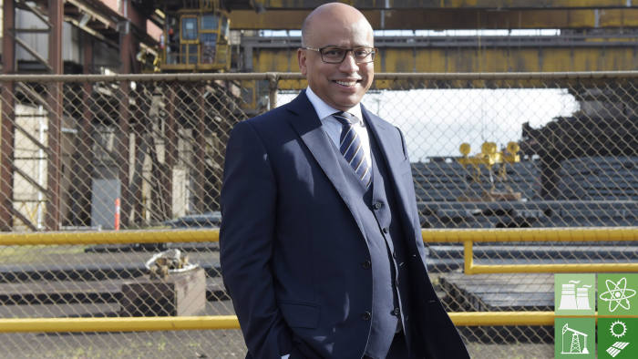 Sanjeev Gupta, executive chairman of Liberty House Group, poses for a photograph in front of the billet yard at Arrium Ltd.'s OneSteel plant in Melbourne, Australia, on Wednesday, July 19, 2017. GFG Alliance, led by Gupta, this month reached a deal to purchase the steel and iron ore assets of Arrium, the Australian mill that's been in administration for more than a year. Photographer: Carla Gottgens/Bloomberg