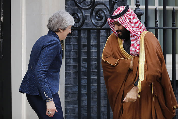 TOPSHOT - Britain's Prime Minister Theresa May (L) greets Saudi Arabia's Crown Prince Mohammed bin Salman (R) outside 10 Downing Street, in central London on March 7, 2018. British Prime Minister Theresa May will "raise deep concerns at the humanitarian situation" in war-torn Yemen with Saudi Crown Prince Mohammed bin Salman during his visit to Britain beginning Wednesday, according to her spokesman. / AFP PHOTO / Tolga AKMENTOLGA AKMEN/AFP/Getty Images