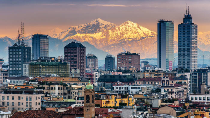 The Milan city skyline with the Alps in the background
