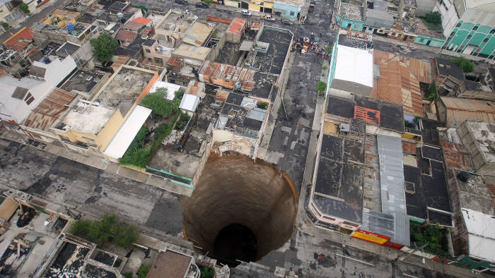 A giant sinkhole caused by the rains of Tropical Storm Agatha is seen in Guatemala City May 31, 2010