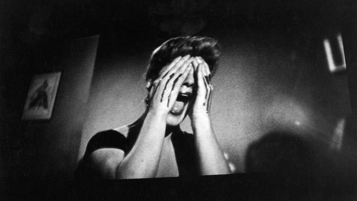 Screaming woman with blood on her hands, 1961