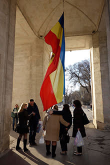 The city’s Holy Gates, with a Moldovan flag hanging from the arch