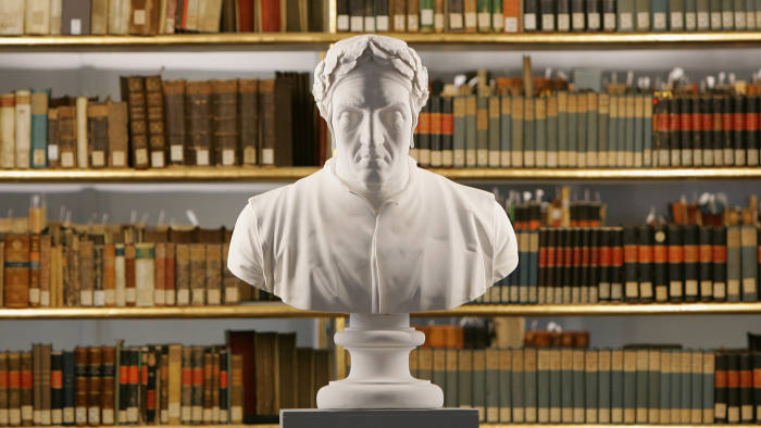 The sculpture of Italian poet Dante Alighieri is seen at the historic Rococo room of the Duchess Anna Amalia Library on October 18, 2007 in Weimar, Germany