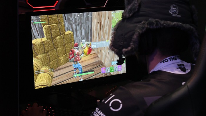 LAS VEGAS, NV - APRIL 21: A gamer plays &quot;Fortnite&quot; against Twitch streamer and professional gamer Tyler &quot;Ninja&quot; Blevins during Ninja Vegas '18 at Esports Arena Las Vegas on April 21, 2018 in Las Vegas, Nevada. Blevins is playing against more than 230 challengers in front of 700 fans in 10 live &quot;Fortnite&quot; games with up to USD 50,000 in cash prizes on the line. He is donating all his winnings to the Alzheimer's Association. (Photo by Ethan Miller/Getty Images)