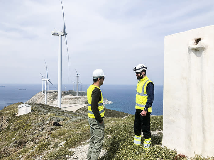 Ioannis Kouris, left, at the wind farm