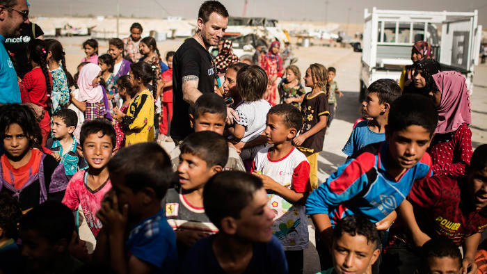 Unicef Ambassador Ewan McGregor meets displaced children at the Debaga IDP camp in northern Iraq on July 28, 2016. Unicef Ambassador Ewan McGregor travelled to northern Iraq last week to see how the conflicts sweeping Iraq and Syria are devastating the lives of children, tearing them from their homes and destroying their futures. Tens of thousands of children in Iraq and Syria have been killed, injured, separated from their parents, forced into work, tortured or recruited into fighting.