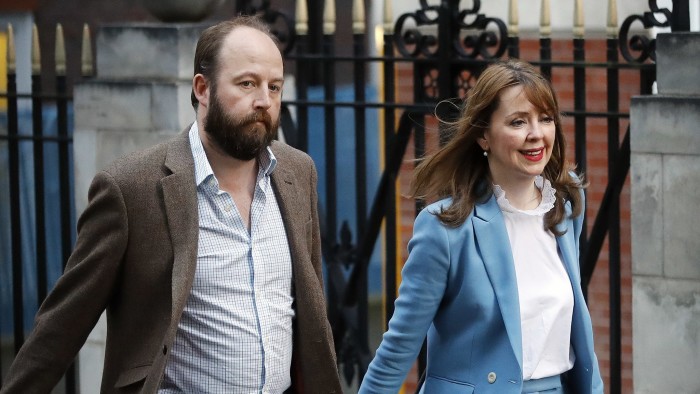 Prime Minister Theresa May's chief of staff Nick Timothy and Joint-chief of staff Fiona Hill leave Conservative Party headquarters in London, Friday, June 9, 2017. (AP Photo/Frank Augstein)
