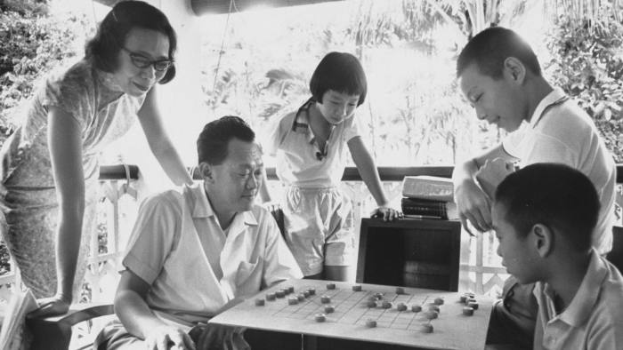 SINGAPORE - MAY 01: Prime Minister Lee Kuan Yew at home with his family playing Chinese chess. (Photo by Larry Burrows/The LIFE Picture Collection/Getty Images)