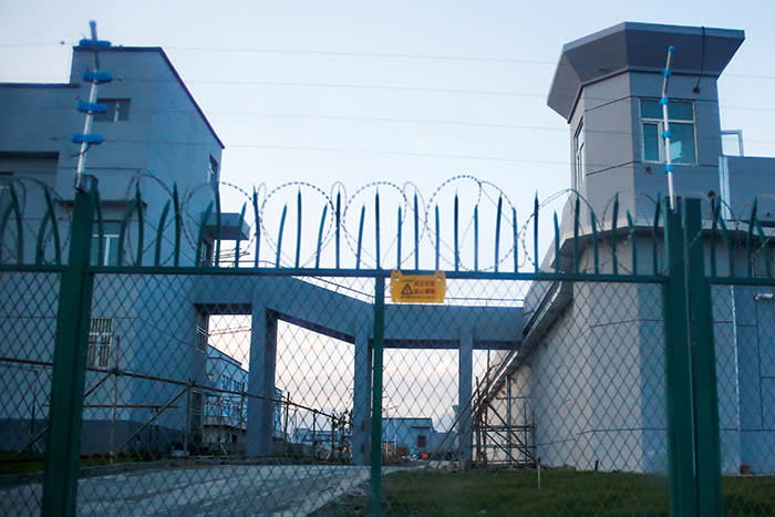 A ‘vocational skills education centre’ in Dabancheng, Xinjiang, still under construction in this picture from September last year, with high barbed wire walls and guard towers