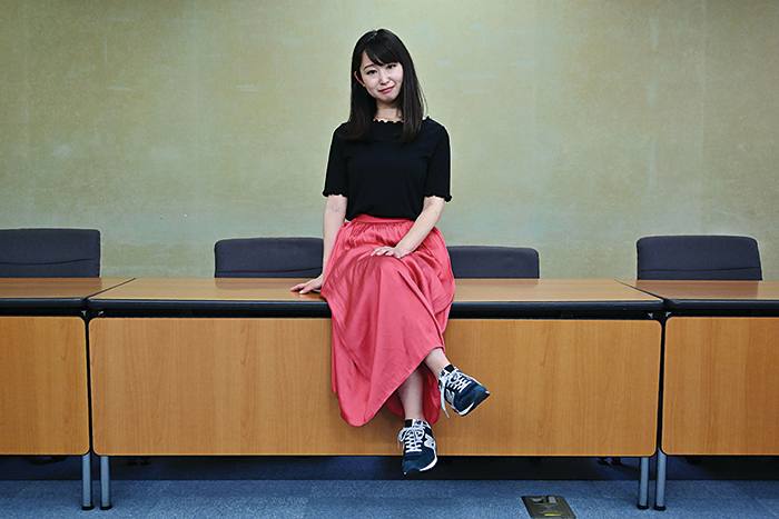 Yumi Ishikawa, leader and founder of the KuToo movement, poses after a press conference in Tokyo on June 3, 2019. - A group of Japanese women on June 3 submitted a petition to the government to protest what they say is a de-facto requirement for female staff to wear high heels at work. The online campaign #KuToo, using a pun from a Japanese word "kutsu" -- that can mean either "shoes" or "pain" -- was launched by actress and freelance writer Yumi Ishikawa and quickly won support from nearly 19,000 people online. (Photo by Charly TRIBALLEAU / AFP) (Photo credit should read CHARLY TRIBALLEAU/AFP/Getty Images)
