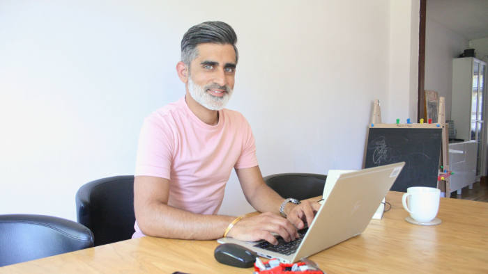 Ganeev Chadha is commercial performance manager at professional services firm EY and has profound hearing loss. He uses subtitles on video calls while working from home to counter is disability.
