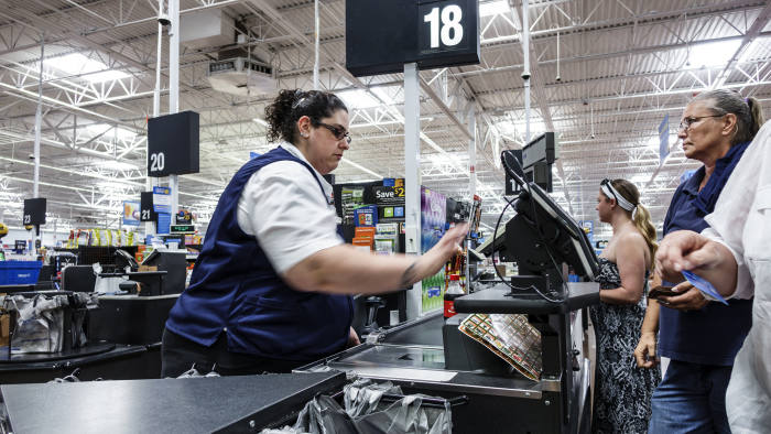 A cashier in Walmart. (Photo by: Jeffrey Greenberg/Universal Images Group via Getty Images)