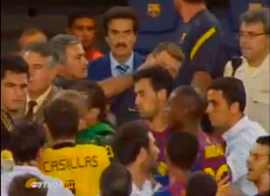 Mourinho seen poking the eye of a Barcelona assistant coach