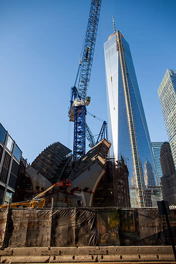 Construction work continues on Calatrava’s ‘ribcage’ roof in the shadow of the 1,776ft-high 1WTC tower