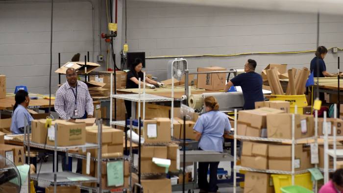 Workers package items for shipment at the Laitram LLC facility in Harahan, Louisiana, U.S., on Friday, May 25, 2018. Although Donald Trump garnered more votes from Louisianans in 2016 than any other presidential candidate in history, his promise to put America first targets the heart of its commerce. Louisiana's reliance on trade makes it a unique microcosm of how the tariff battle will affect America. Photographer: Callaghan O'Hare/Bloomberg