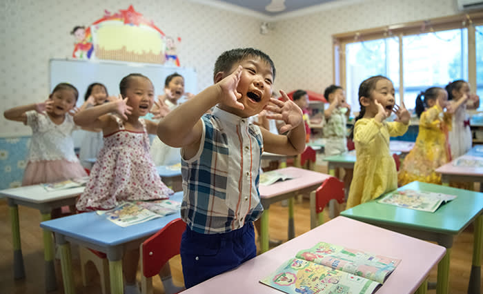 PYONGYANG, NORTH KOREA - AUGUST 23: Children gesture and shout at the instruction of a teacher at Gyongsang Kindergarten on August 23, 2018 in Pyongyang, North Korea. Despite ongoing international negotiations aimed at easing tensions on the Korean peninsula, the Democratic People's Republic of Korea remains the most isolated and secretive nation on earth. Since it's formation in 1948 the country has been led by the Kim dynasty, a three-generation lineage of North Korean leadership descended from the country's first leader, Kim Il-sung followed by Kim Jong-il and grandson and current leader, Kim Jong-un. Although major hostilities ceased with the signing of the Armistice in 1953, the two Koreas have remained technically at war and the demilitarised zone along the border continues to be the most fortified border in the world. (Photo by Carl Court/Getty Images)