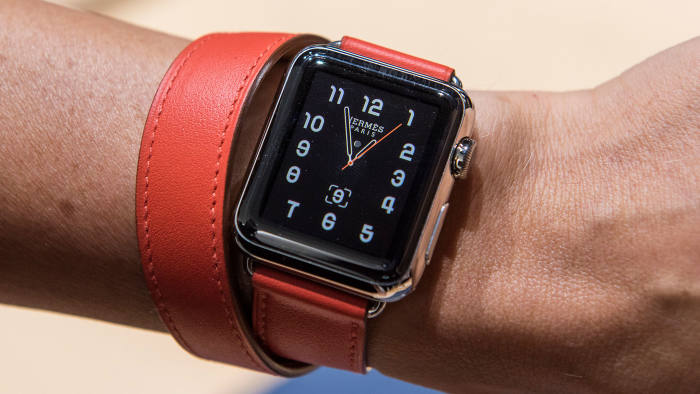 the Apple Watch, shown here with a leather strap by Hermès