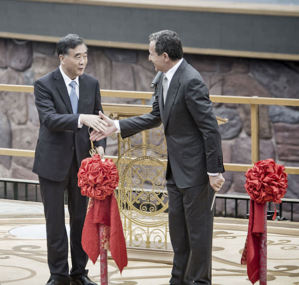 Disney’s chief executive Bob Iger shakes hands with China vice-premier Wang Yang 