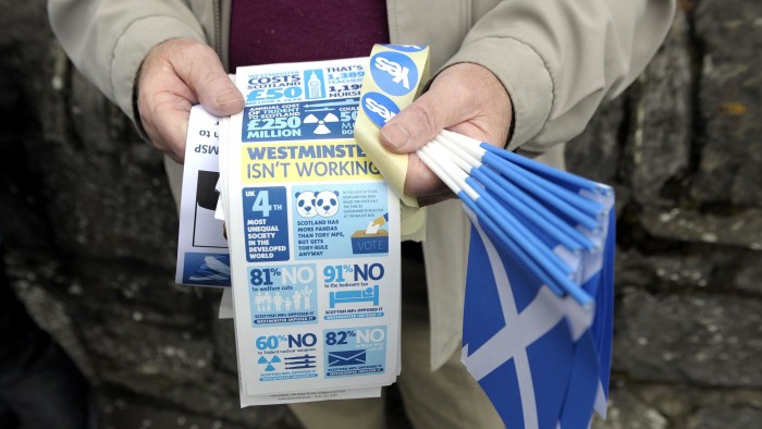 Pr-independence goodies are distributed by supporters outside the Birnam Highland Games in Perthshire, Scotland, on August 30, 2014. Support for Scottish independence is increasing three weeks ahead of a referendum, a poll published on August 29 showed, amid attempts by British Prime Minister David Cameron to make the business case for retaining the union. AFP PHOTO/ANDY BUCHANANAndy Buchanan/AFP/Getty Images