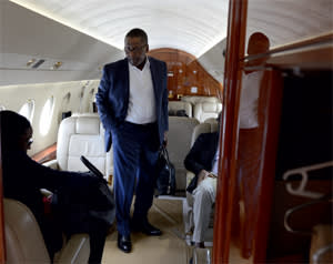 Aliko Dangote aboard one of his private jets