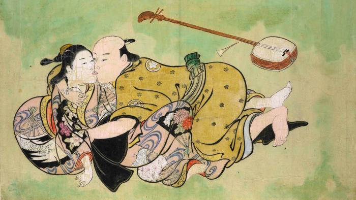 Japanese print showing a man and woman kissing on the floor by Nishikawa Sukenobu