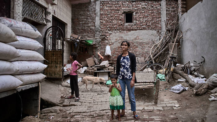 City life: Jyoti with her siblings in the yard of their home in Delhi