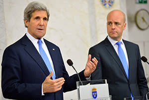 John Kerry and Swedish PM Fredrik Reinfeldt at the Arctic summit, May 2013