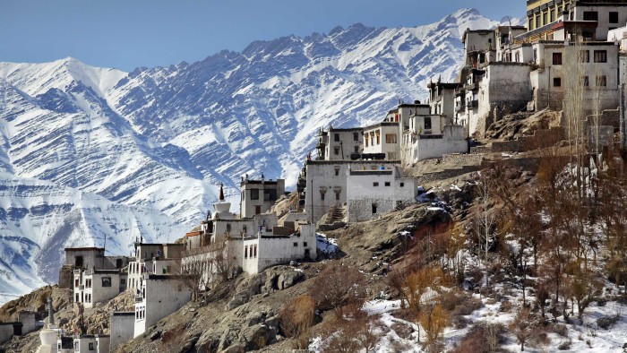 The monastery amid snow-covered mountains