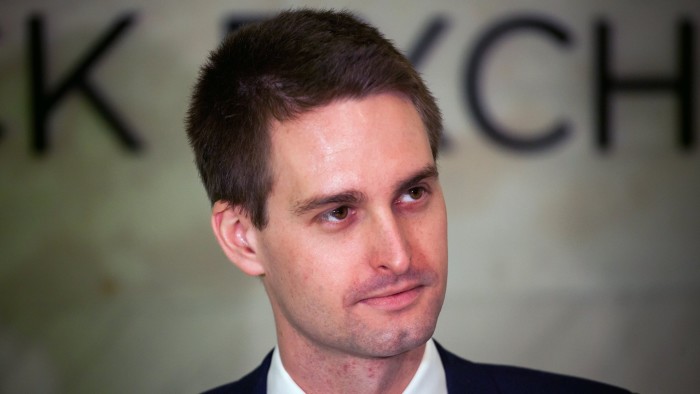 Evan Spiegel, co-founder and chief executive officer of Snap Inc., stands on the floor of the New York Stock Exchange (NYSE) during the company's initial public offering (IPO) in New York, U.S., on Thursday, March 2, 2017. Snap Inc., maker of the disappearing photo app that relies upon the fickle favor of millennials, jumped in its trading debut after pricing its initial public offering above the marketed range. Photographer: Michael Nagle/Bloomberg