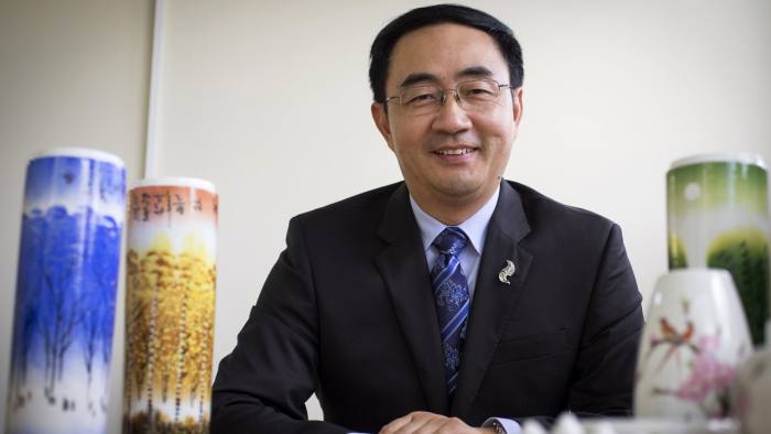 In this Jan. 26, 2016 photo, Jian Yang, a New Zealand lawmaker who was born in China, talks about his wishes for the Chinese New Year in Auckland, New Zealand. Yang said in a statement Wednesday, Sept. 13, 2017 he's loyal to his new home after media reported he'd spent a decade at top Chinese military colleges and was investigated by New Zealand's intelligence agency. (Greg Bowker/New Zealand Herald via AP)